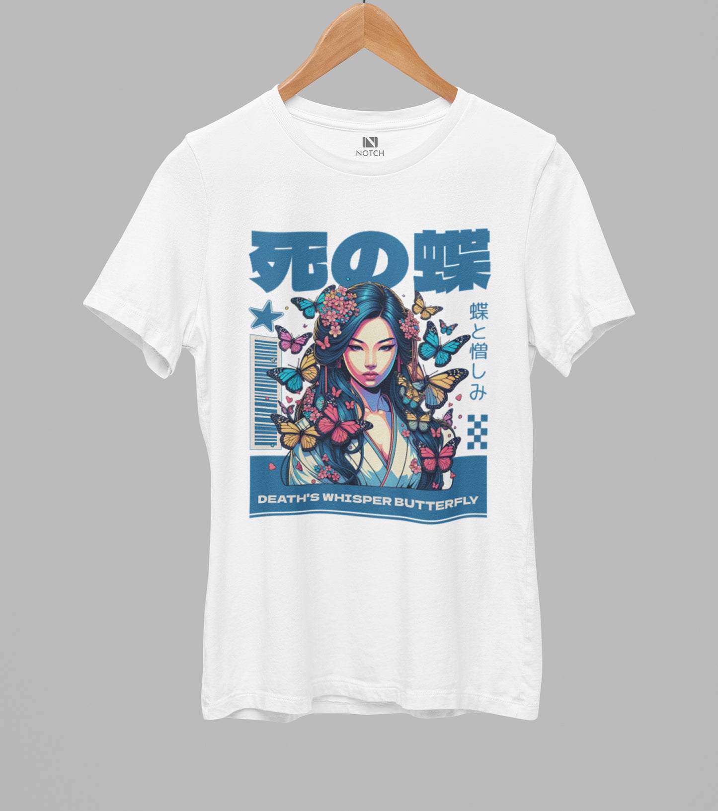 White t-shirt with a colorful graphic design featuring a woman and butterflies on a gray background