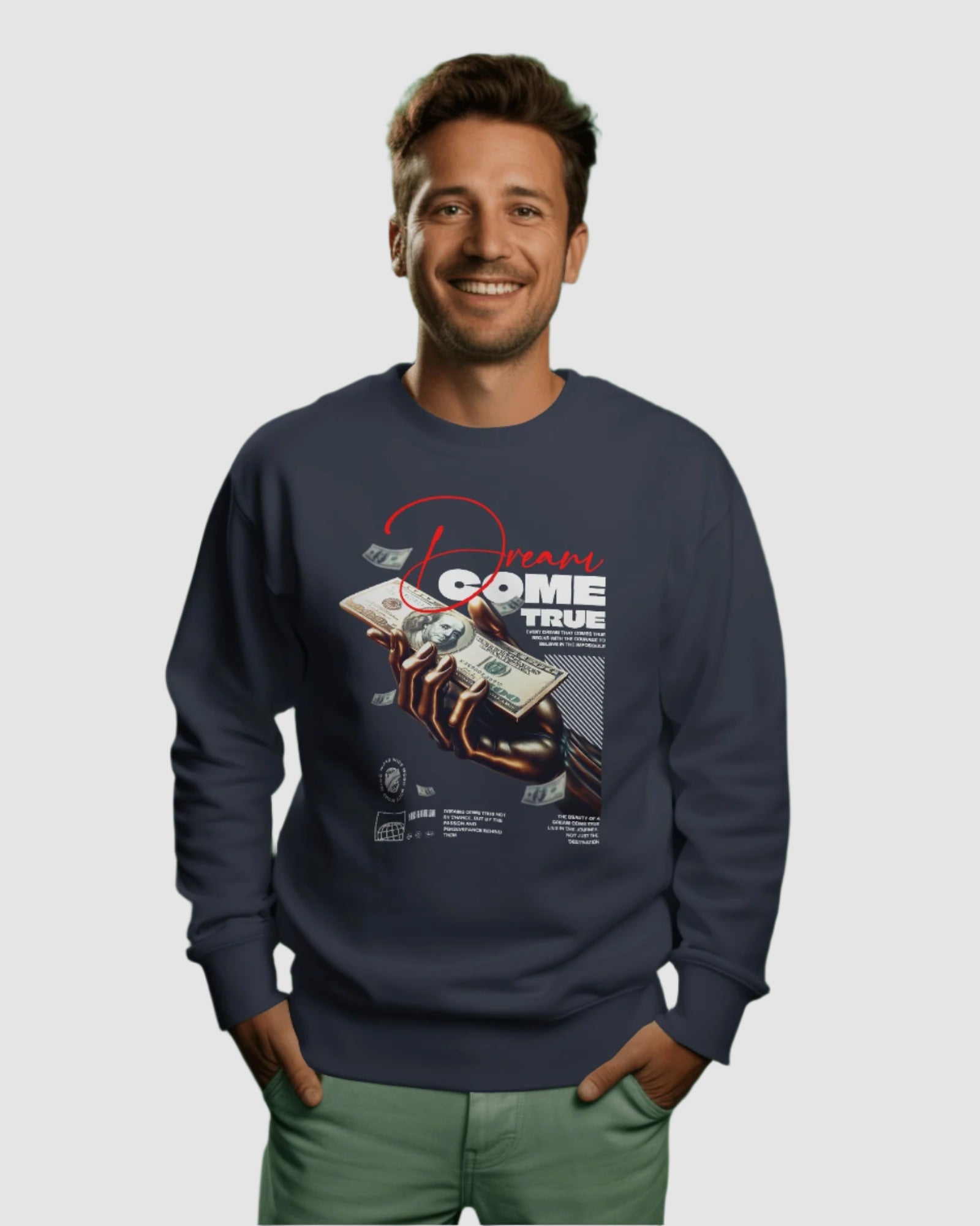 Man wearing a navy blue sweatshirt with graphic design on a green background