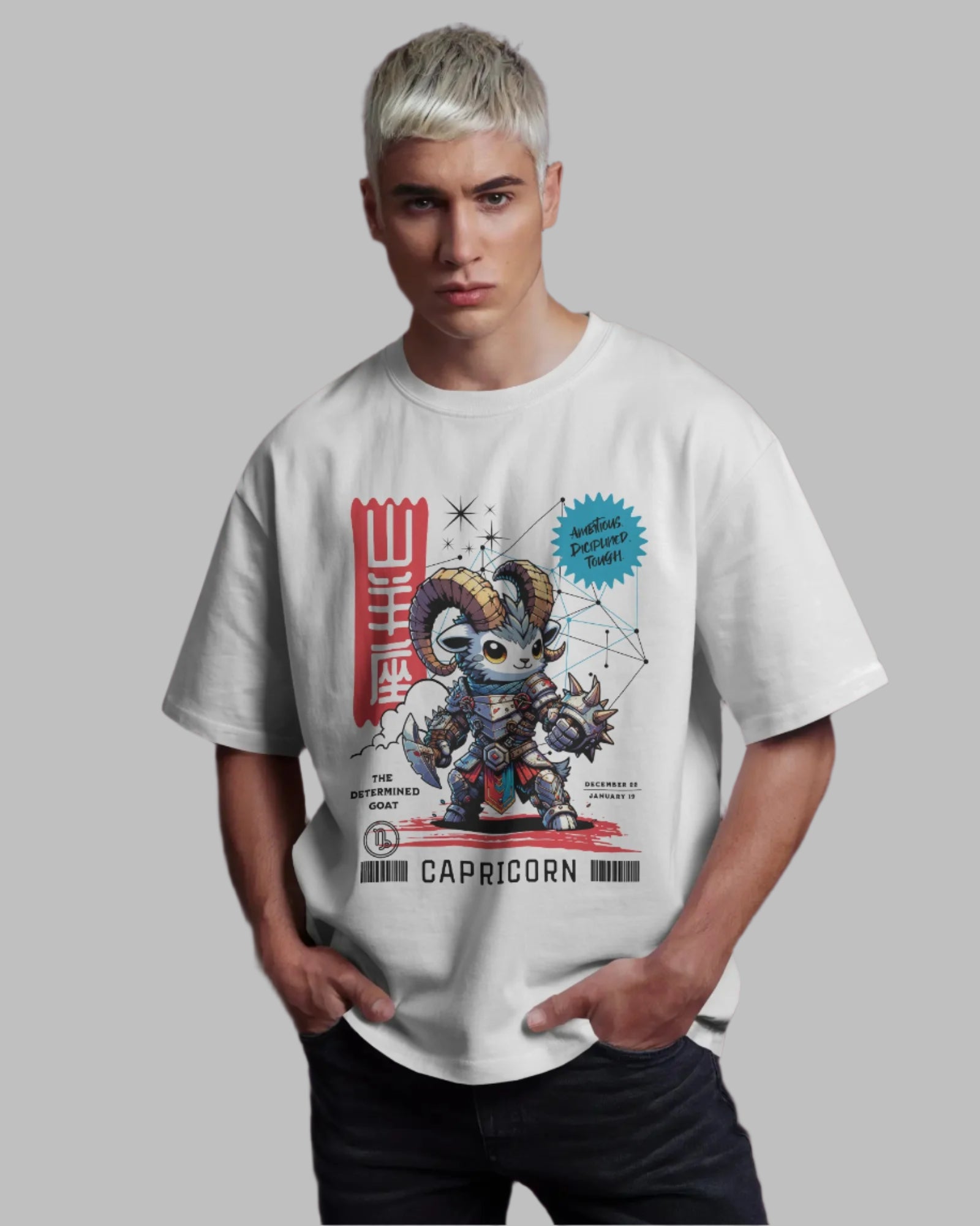 Person wearing a white t-shirt with a Capricorn zodiac design on a dark background